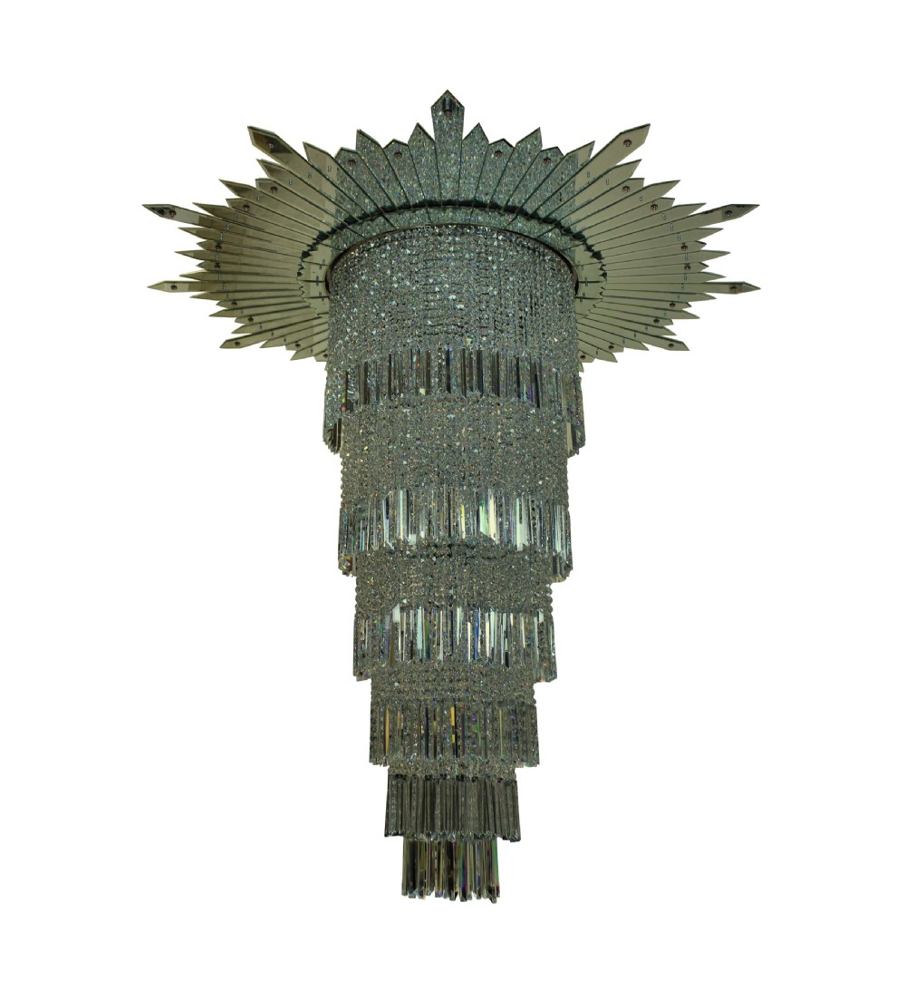 A monumental tiered Art Deco chandelier featuring a sunburst mirrored corona above cascading cylindrical layers of crystal prisms. View II