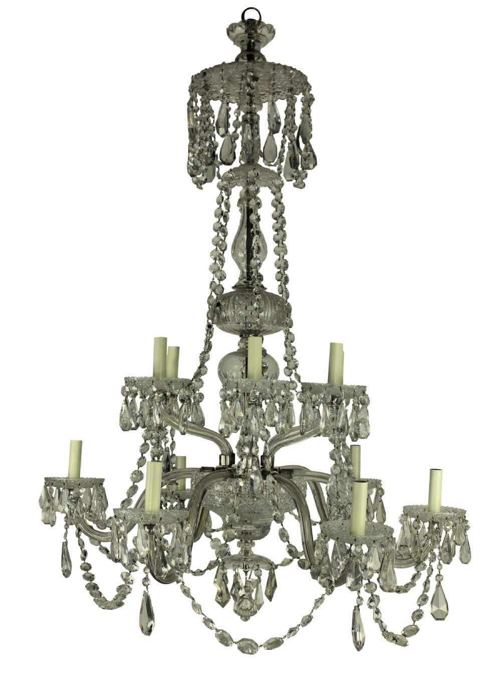 A multi-tiered nineteenth-century English cut glass chandelier featuring curved glass arms, faceted crystal drops, and glass candle sleeves.