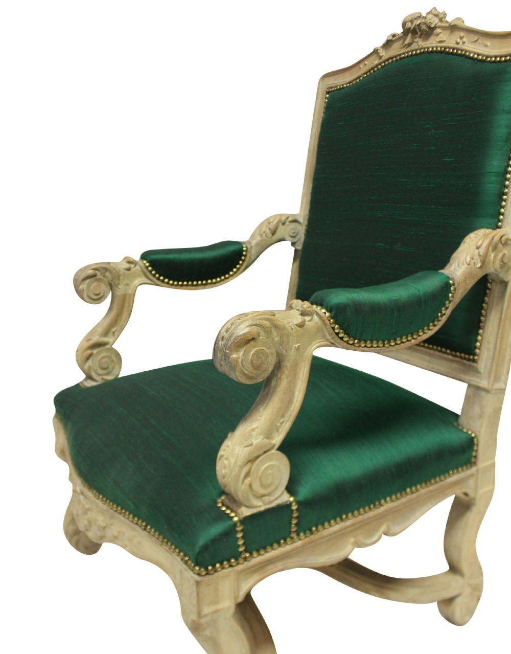 A Louis XIV style carved wood armchair upholstered in vibrant emerald green silk with brass stud details. View II