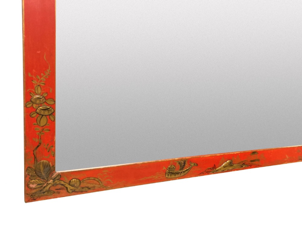 A pair of square wall mirrors featuring bright scarlet japanned frames decorated with gilded chinoiserie foliage and figures. View IV
