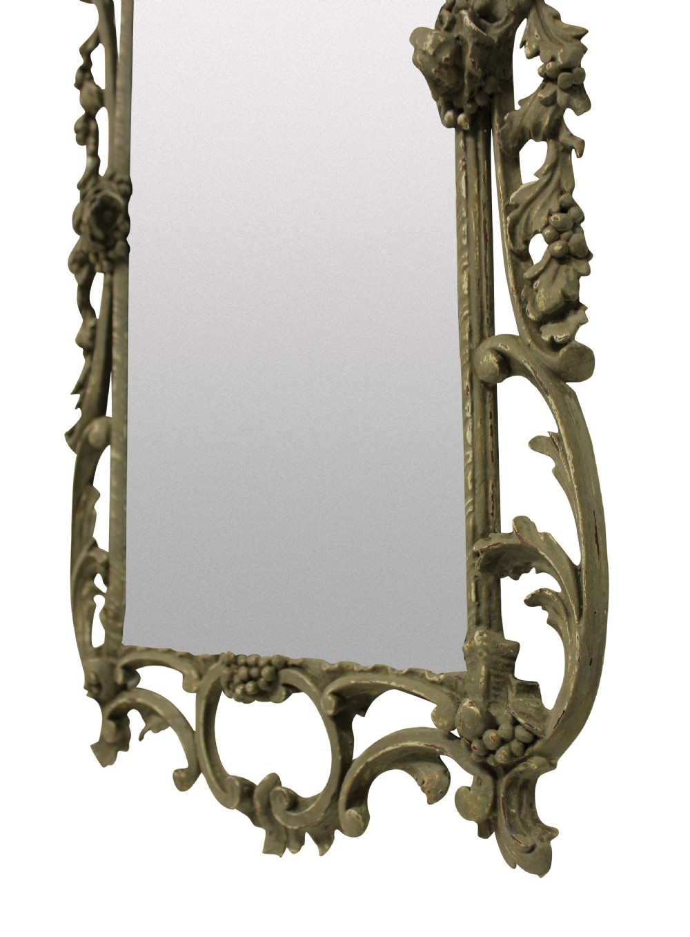 An ornate George III style rectangular wall mirror with a carved giltwood frame featuring a cherub crest, pierced acanthus scrolls, and grapevine motifs. View II