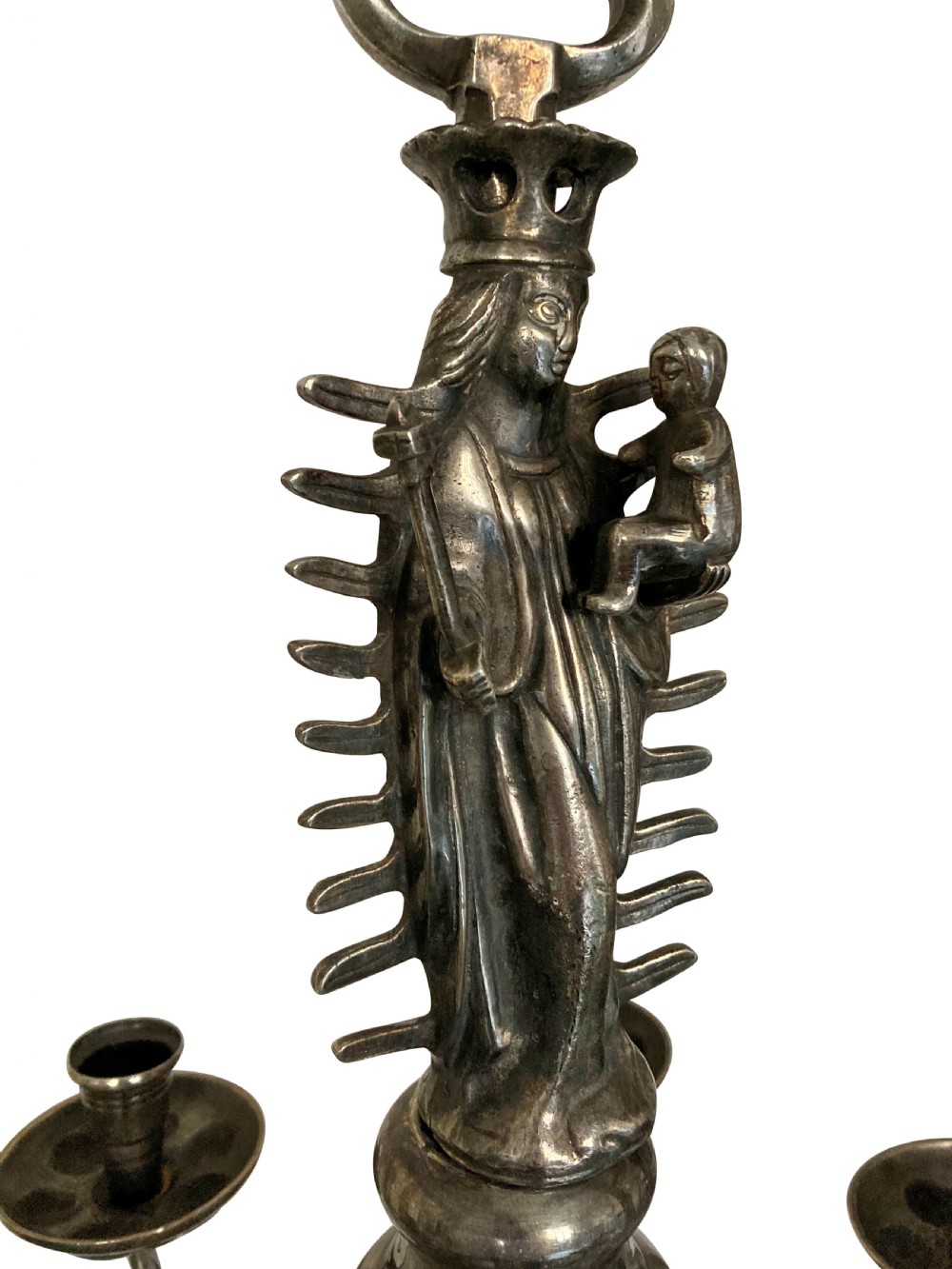 A silver-plated Flemish Gothic candle chandelier featuring a central Madonna and Child figure, baluster stem, and six scrolling arms with openwork tracery. View II