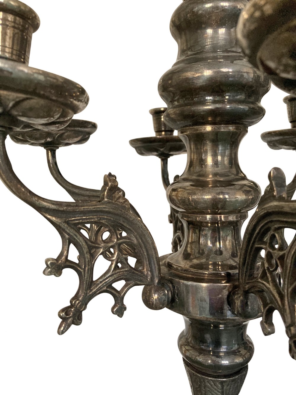 A silver-plated Flemish Gothic candle chandelier featuring a central Madonna and Child figure, baluster stem, and six scrolling arms with openwork tracery. View III