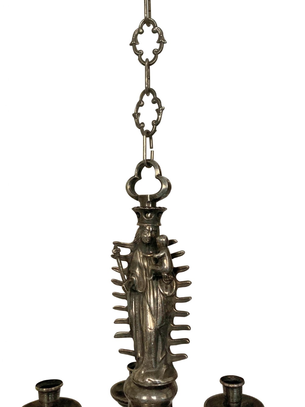 A silver-plated Flemish Gothic candle chandelier featuring a central Madonna and Child figure, baluster stem, and six scrolling arms with openwork tracery. View IV