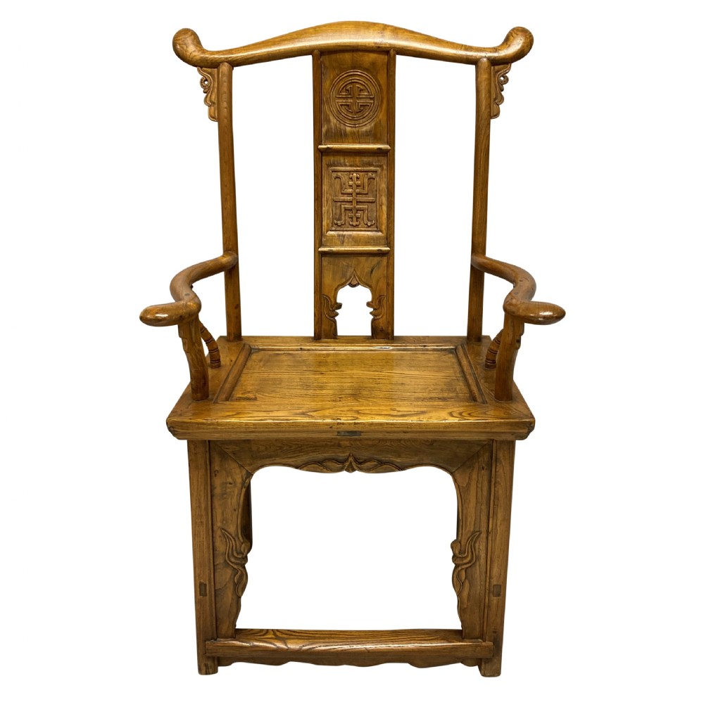 A pair of nineteenth-century Chinese elm yoke-back armchairs featuring carved central back splats and curved armrests. View III