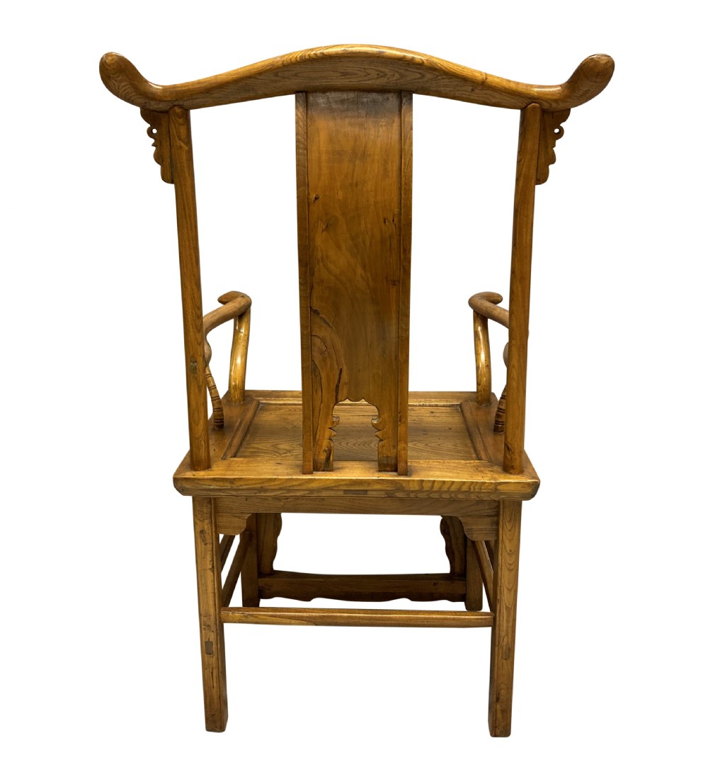 A pair of nineteenth-century Chinese elm yoke-back armchairs featuring carved central back splats and curved armrests. View VIII