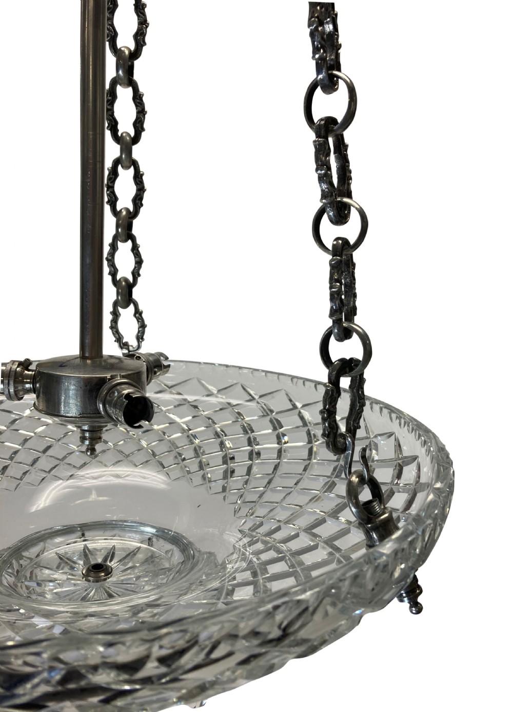 A nineteenth-century cut glass dish light featuring a diamond-patterned crystal bowl suspended by three silver-plated chains from a central rod. View V