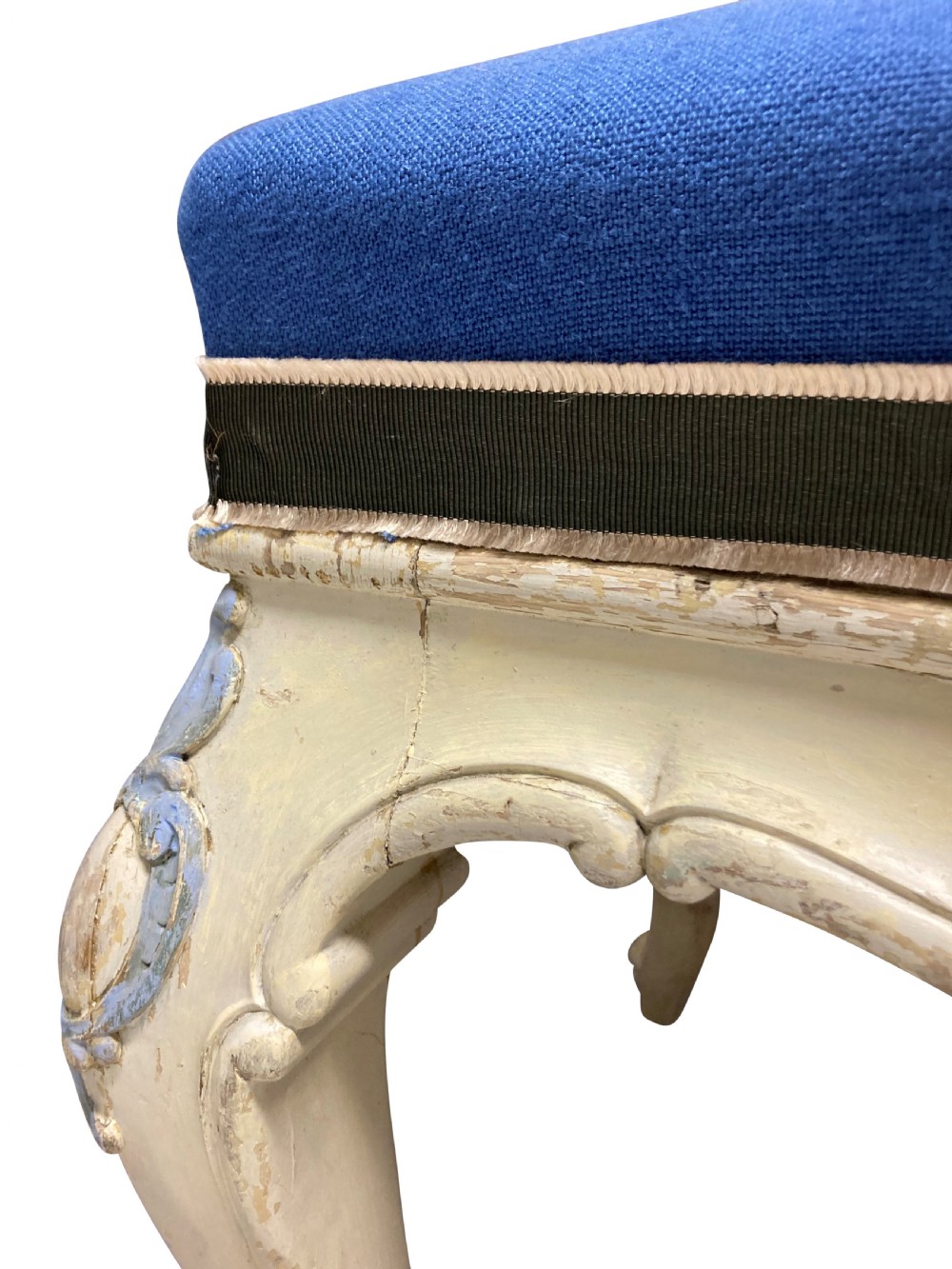 A pair of Louis XV style stools featuring cream and light blue painted carved wooden bases with cabriole legs and royal blue upholstered seats. View VI