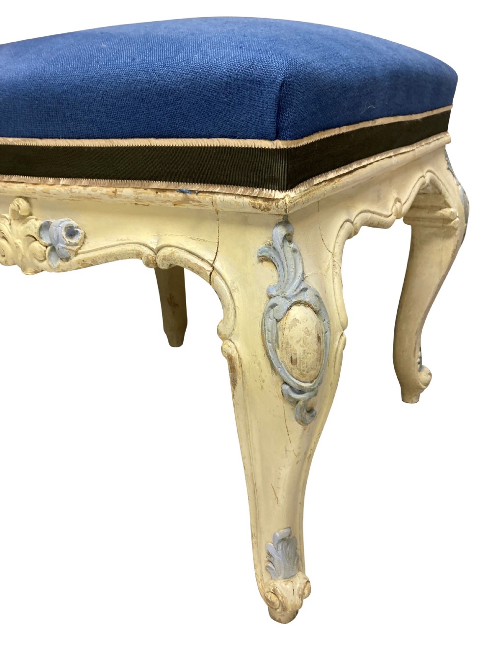 A pair of Louis XV style stools featuring cream and light blue painted carved wooden bases with cabriole legs and royal blue upholstered seats. View VII