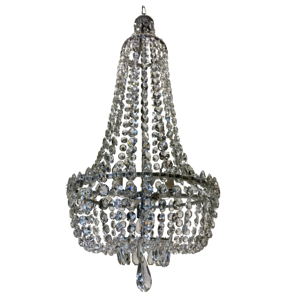 A classic tent and bag chandelier crafted from strung cut glass beads and faceted drops on a metal frame.