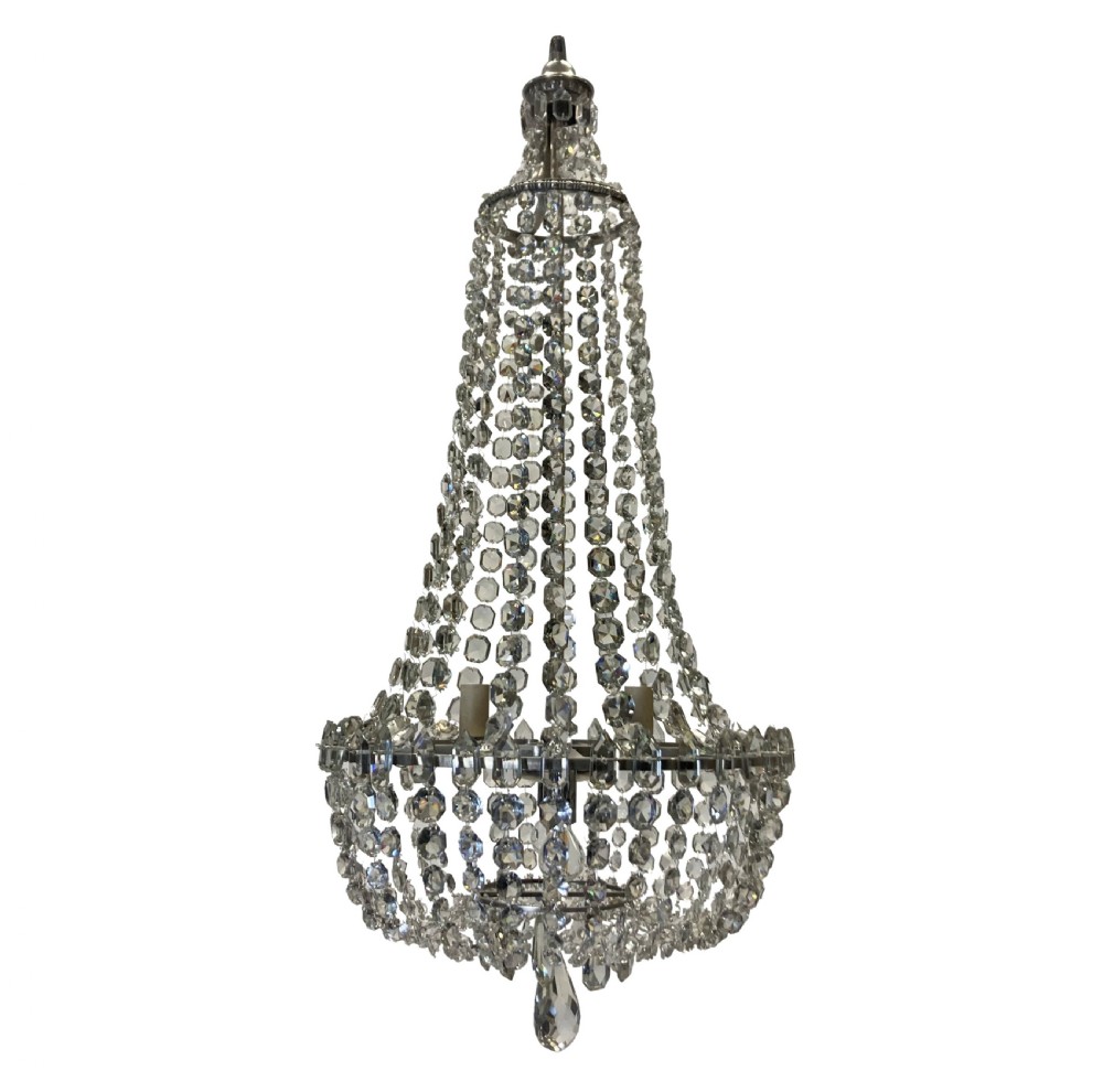 A classic tent and bag chandelier crafted from strung cut glass beads and faceted drops on a metal frame. View II