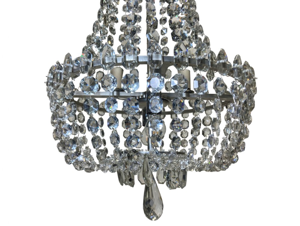 A classic tent and bag chandelier crafted from strung cut glass beads and faceted drops on a metal frame. View X