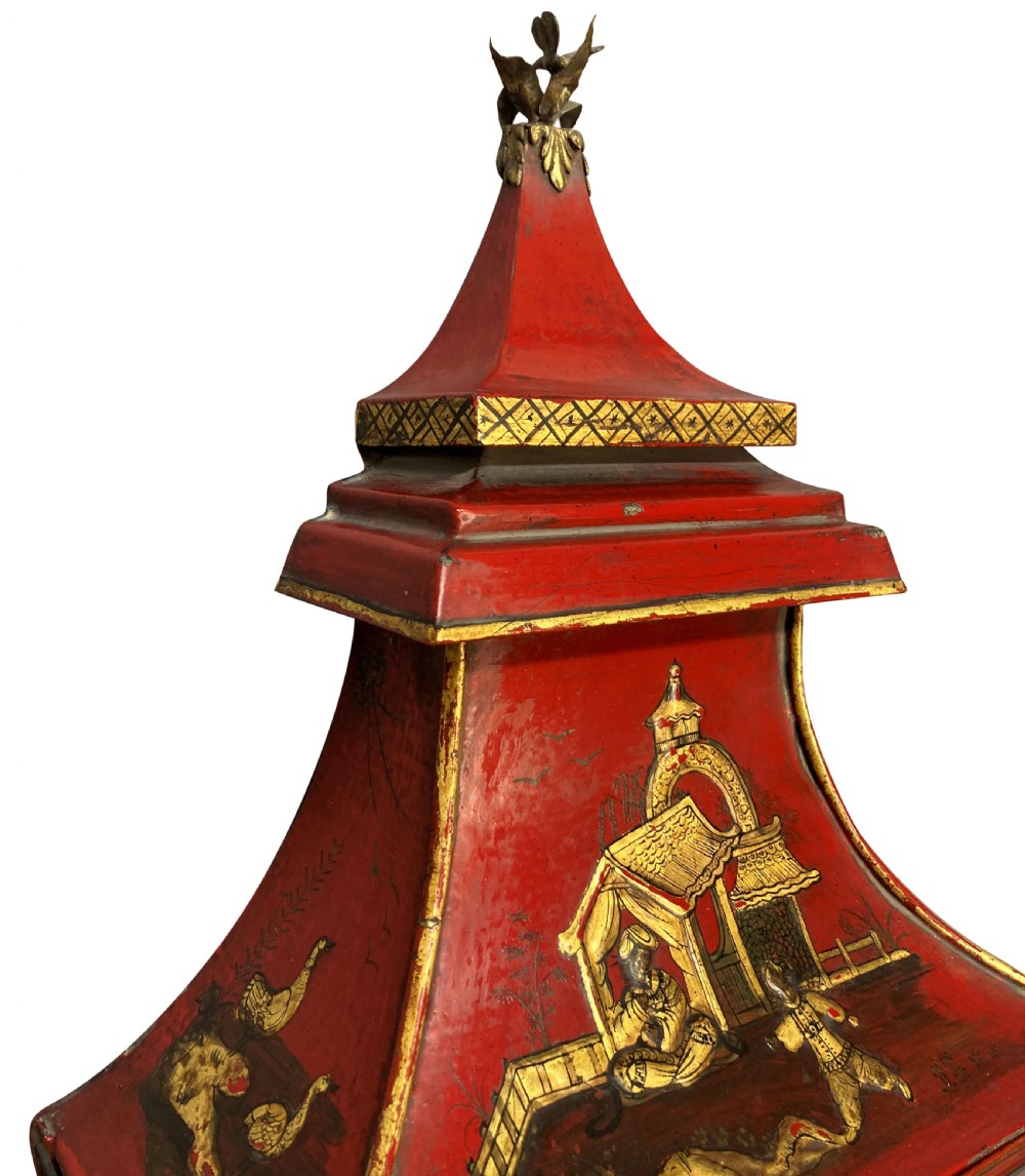 A pair of Regency style wall lanterns finished in scarlet red japanning with hand-painted gold chinoiserie motifs and pagoda tops. View II