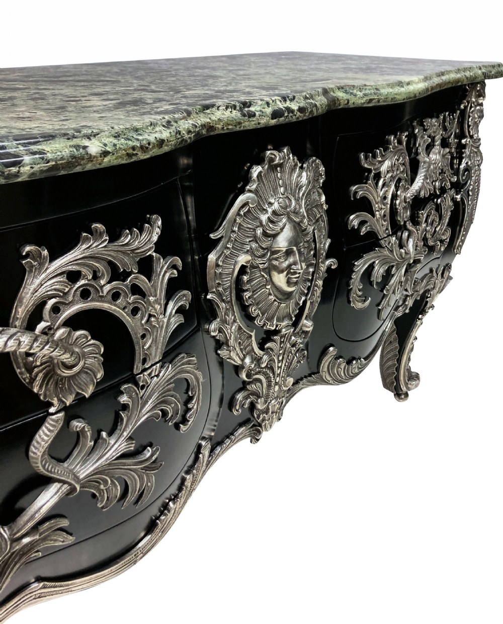 A French Rococo style black lacquered commode featuring a green marble top and elaborate silver-coloured ornamental mounts. View II