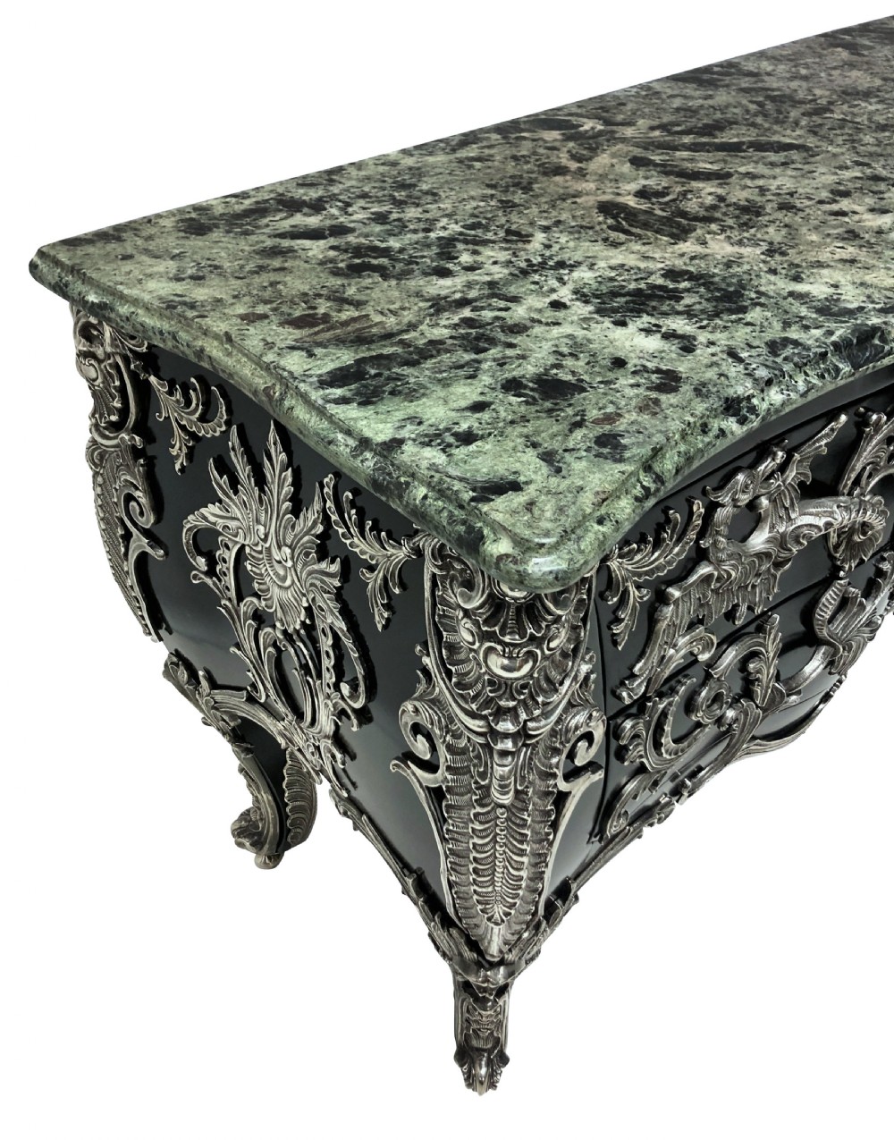 A French Rococo style black lacquered commode featuring a green marble top and elaborate silver-coloured ornamental mounts. View X