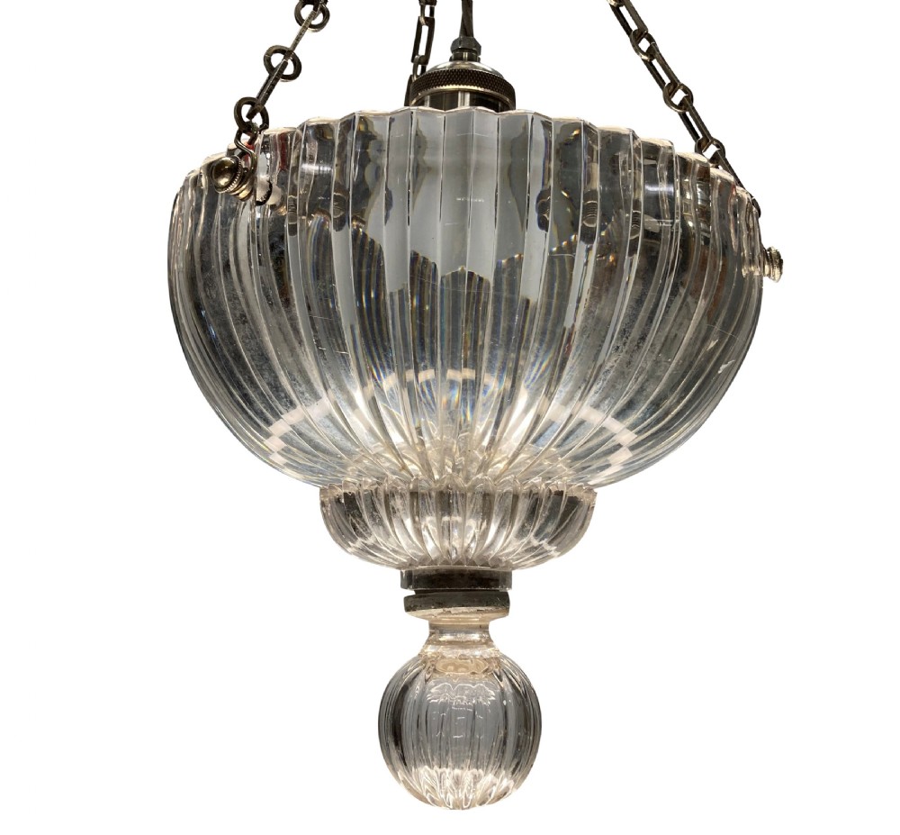 An Edwardian pendant light featuring a fluted clear cut glass bowl suspended by three silver-plated chains from a cast ceiling fitting. View IV