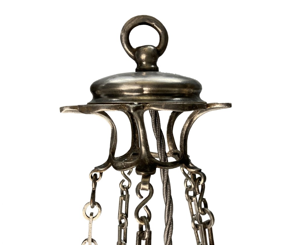 An Edwardian hanging dish light featuring diamond-cut clear glass suspended by metal chains with crystal drop prisms at the base. View V