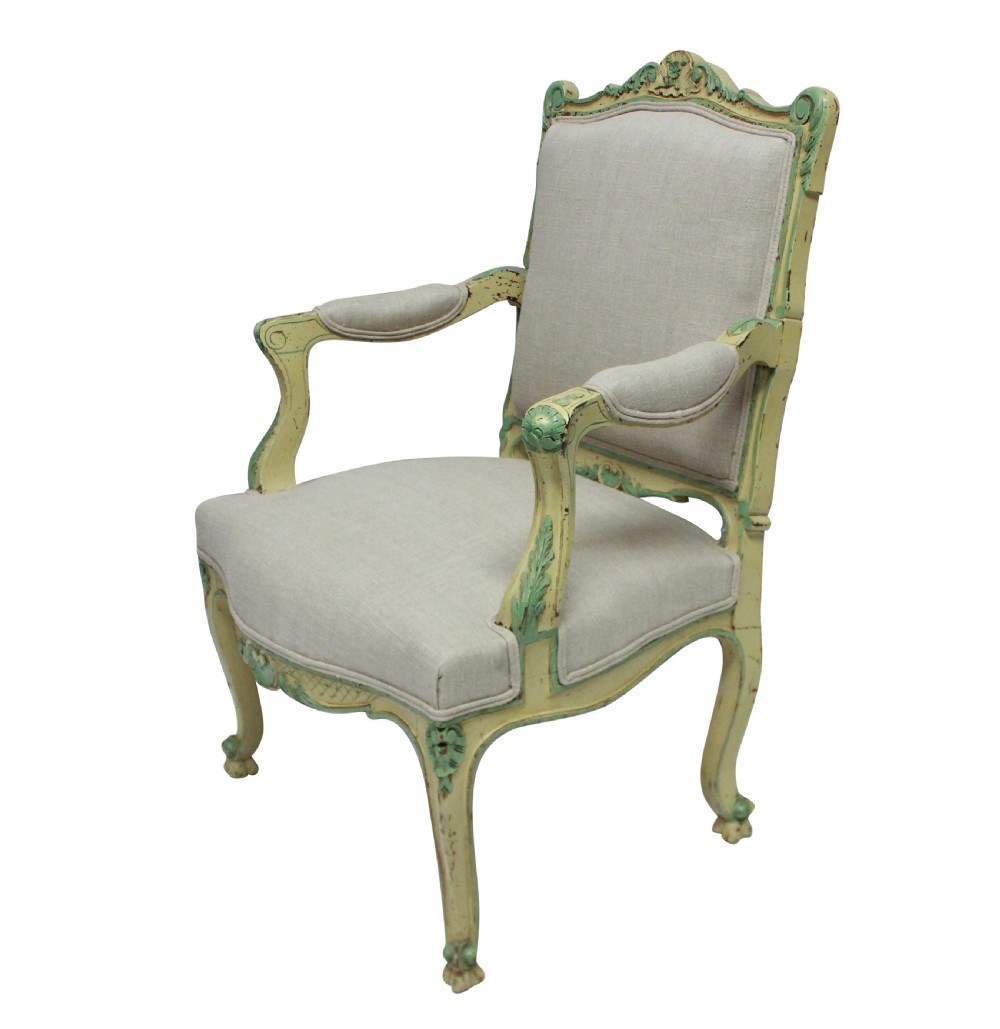 A pair of 1930s Louis XV style open armchairs with distressed cream and green painted wooden frames and neutral linen upholstery. View III