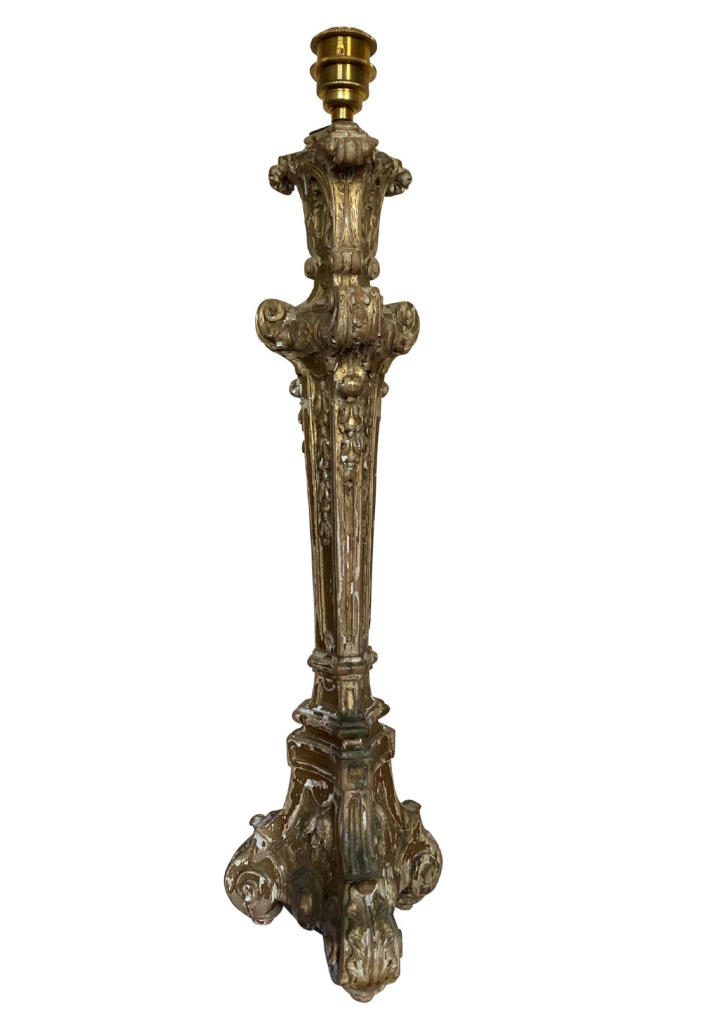 A tall English Baroque style carved giltwood table lamp base featuring elaborate scrollwork and a brass electrical socket. View II