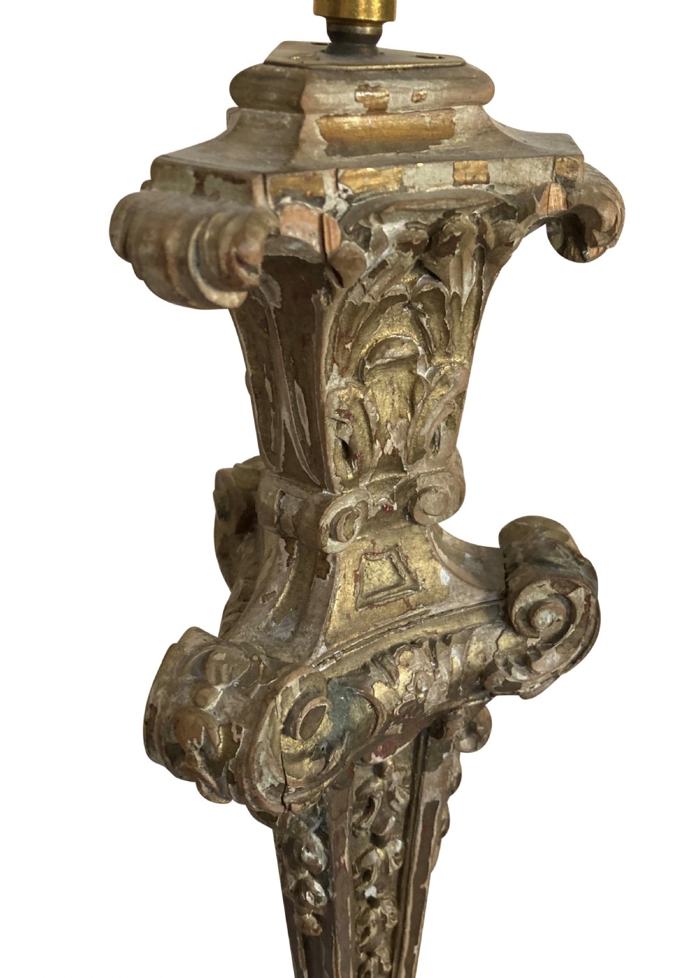 A tall English Baroque style carved giltwood table lamp base featuring elaborate scrollwork and a brass electrical socket. View VI