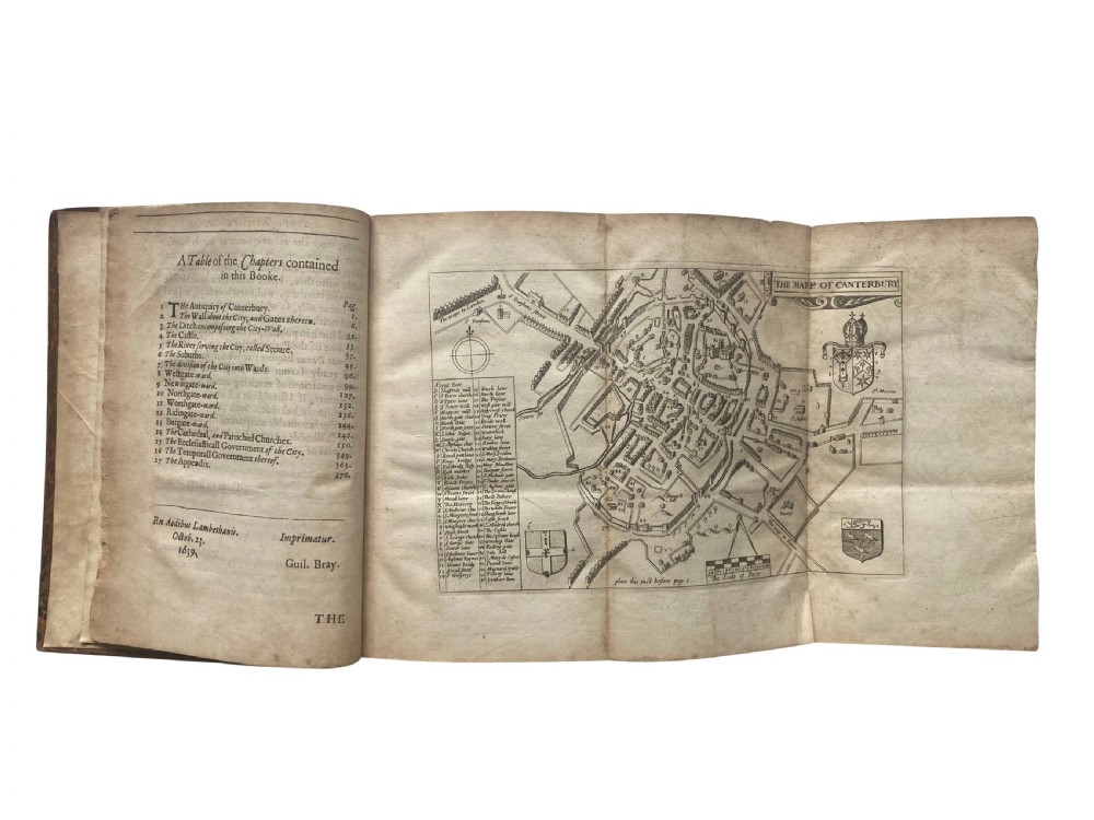 An open 17th-century printed book title page displaying black letterpress typography on cream rag paper titled The Antiquities of Canterbury by William Somner, dated 1640. View V