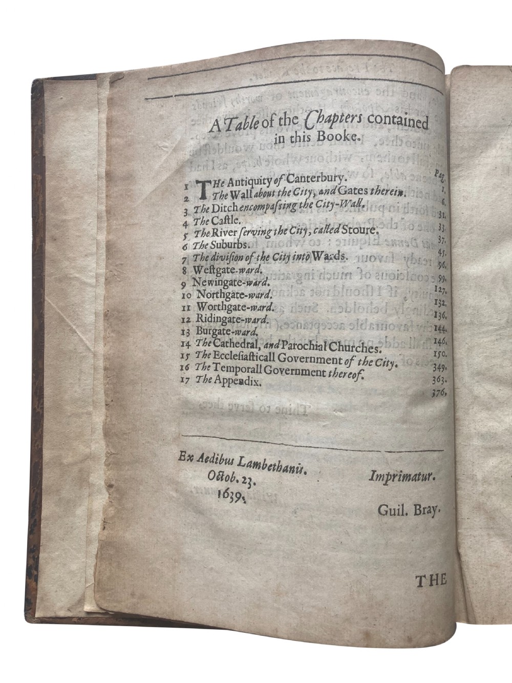 An open 17th-century printed book title page displaying black letterpress typography on cream rag paper titled The Antiquities of Canterbury by William Somner, dated 1640. View VI