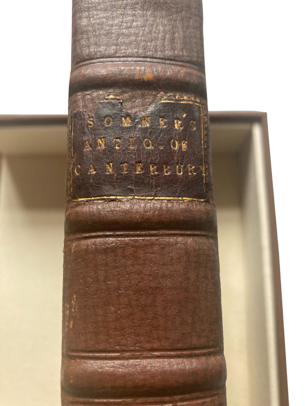 An open 17th-century printed book title page displaying black letterpress typography on cream rag paper titled The Antiquities of Canterbury by William Somner, dated 1640. View VIII