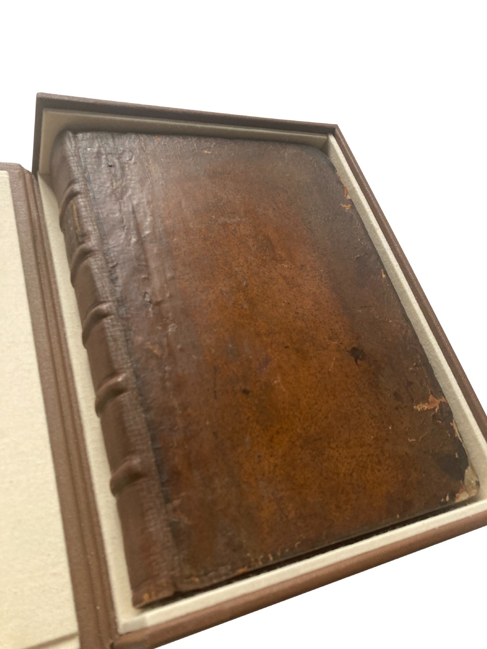 An open 17th-century printed book title page displaying black letterpress typography on cream rag paper titled The Antiquities of Canterbury by William Somner, dated 1640. View IX