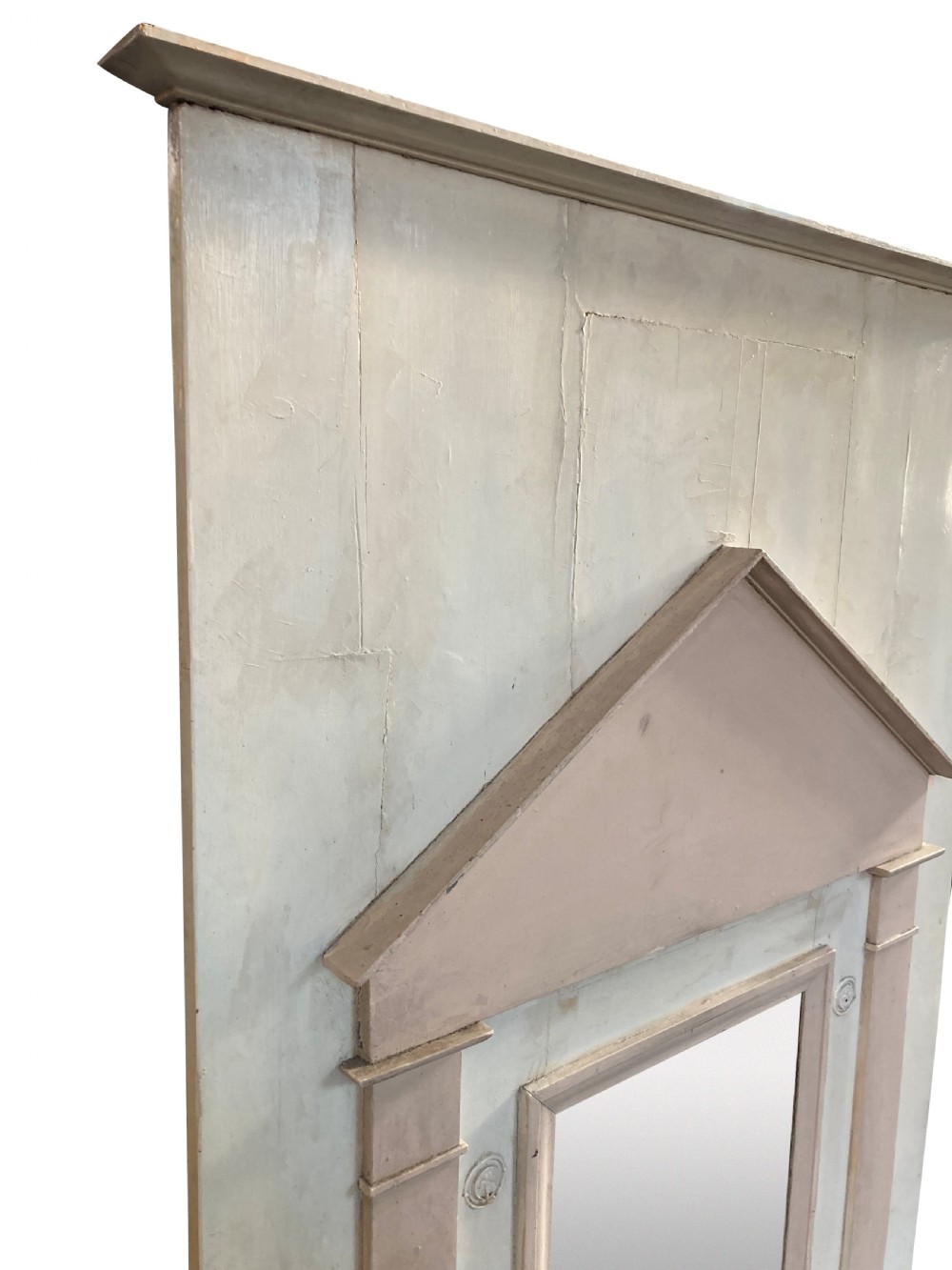 An 18th-century architectural trumeau mirror featuring a painted off-white frame with a triangular pediment, flanking pilasters, and a rectangular mirrored panel. View II