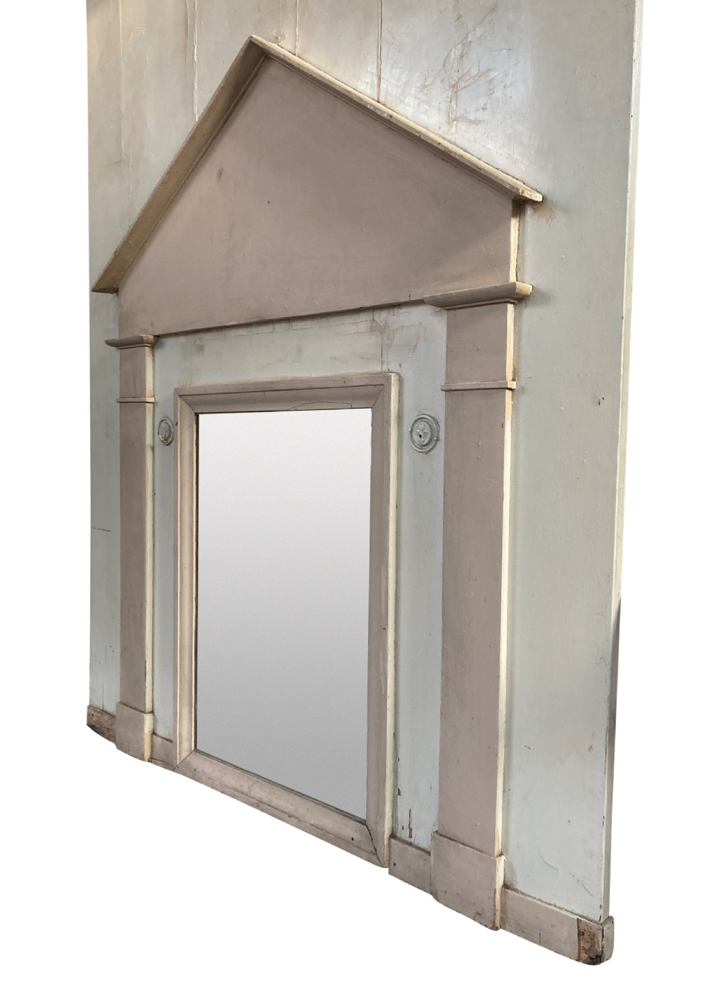 An 18th-century architectural trumeau mirror featuring a painted off-white frame with a triangular pediment, flanking pilasters, and a rectangular mirrored panel. View III