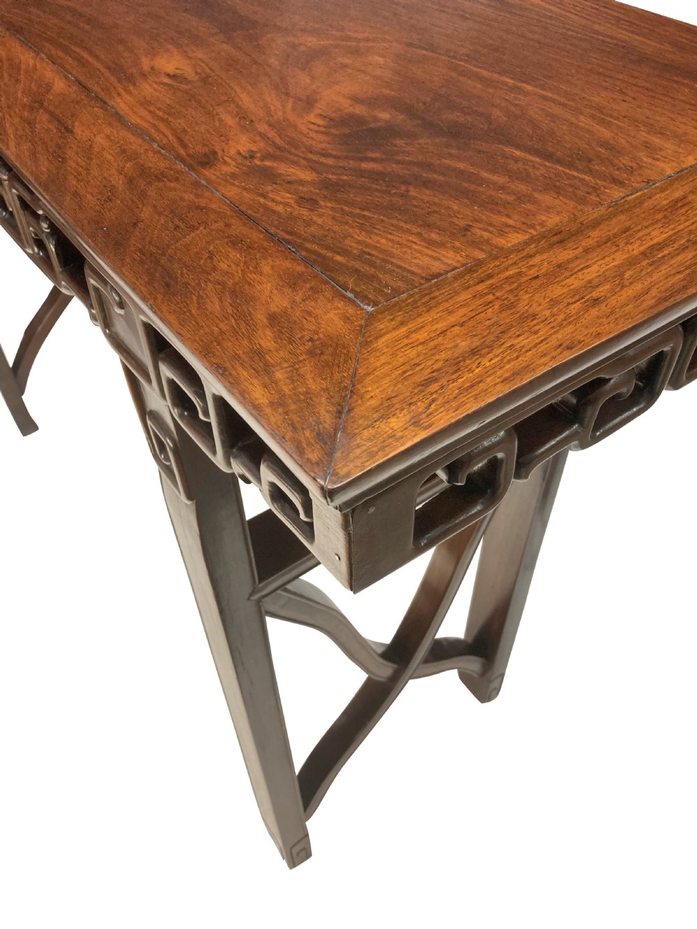 A dark brown Chinese Qing dynasty console table featuring an openwork geometric fretwork apron and curved side stretchers. View XI
