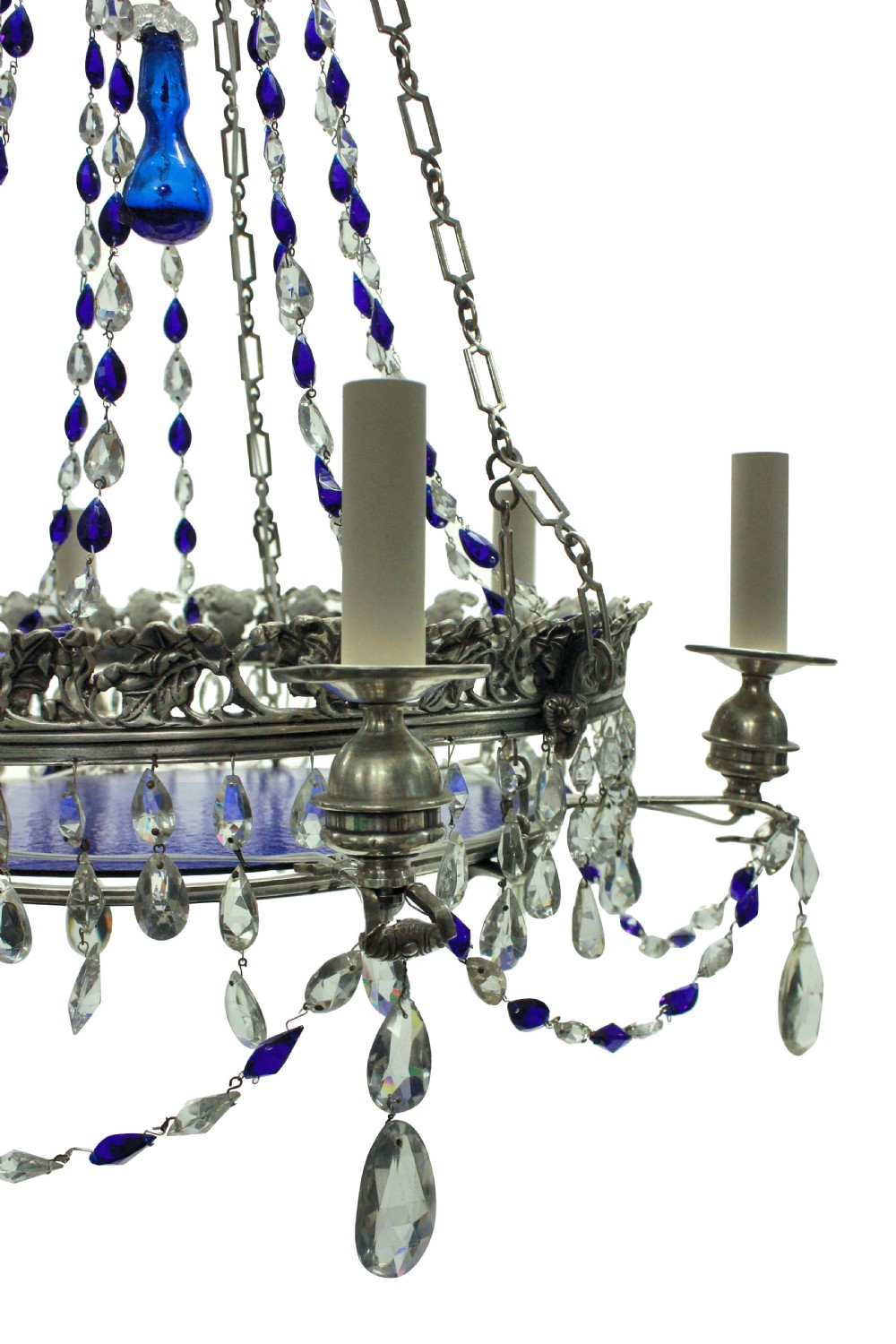 A 19th-century silver-plated circular chandelier featuring clear and cobalt blue cut glass drops, candle sleeves, and a central cobalt glass insert suspended by chains. View IV