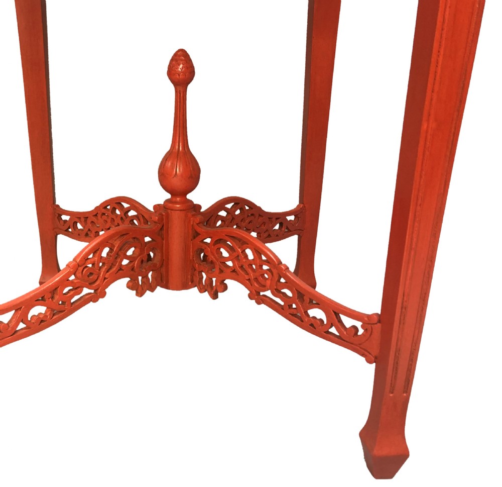 A pair of scarlet red square side tables featuring serpentine tops, carved corner brackets, and intricate pierced X-stretchers with central finials. View VI