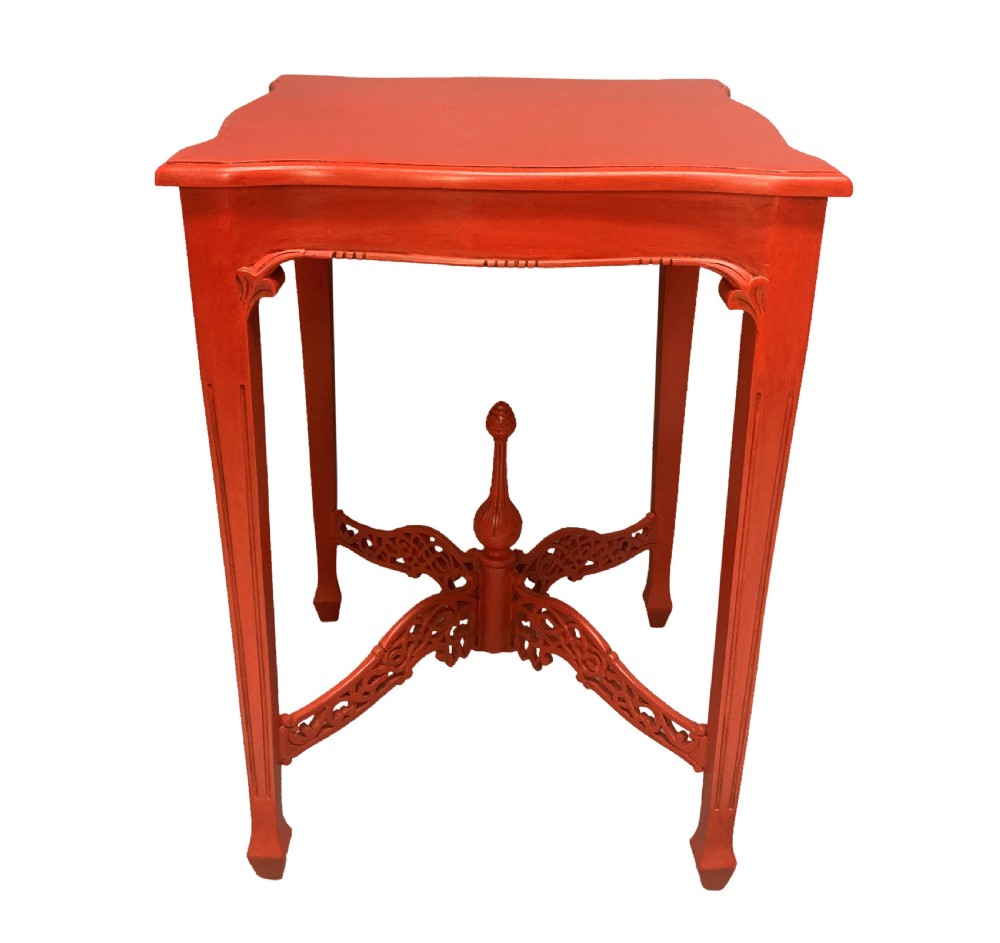 A pair of scarlet red square side tables featuring serpentine tops, carved corner brackets, and intricate pierced X-stretchers with central finials. View VII