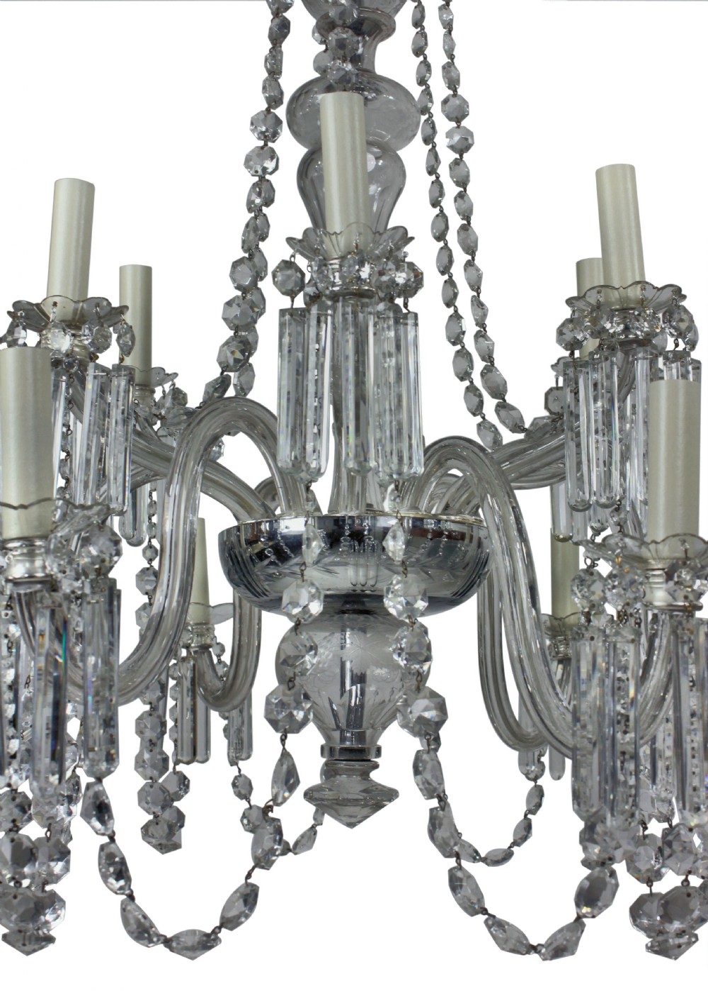 A nineteenth-century English cut glass chandelier featuring twelve candle-style lights, glass swags, hung faceted droplets, and a central baluster stem. View II