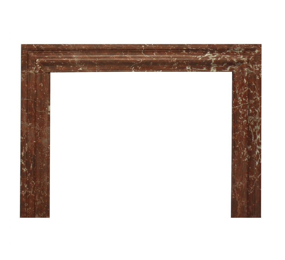 A large dark polished mahogany chimneypiece featuring an integrated panelled overmantel and architectural stepped mouldings. View XIII