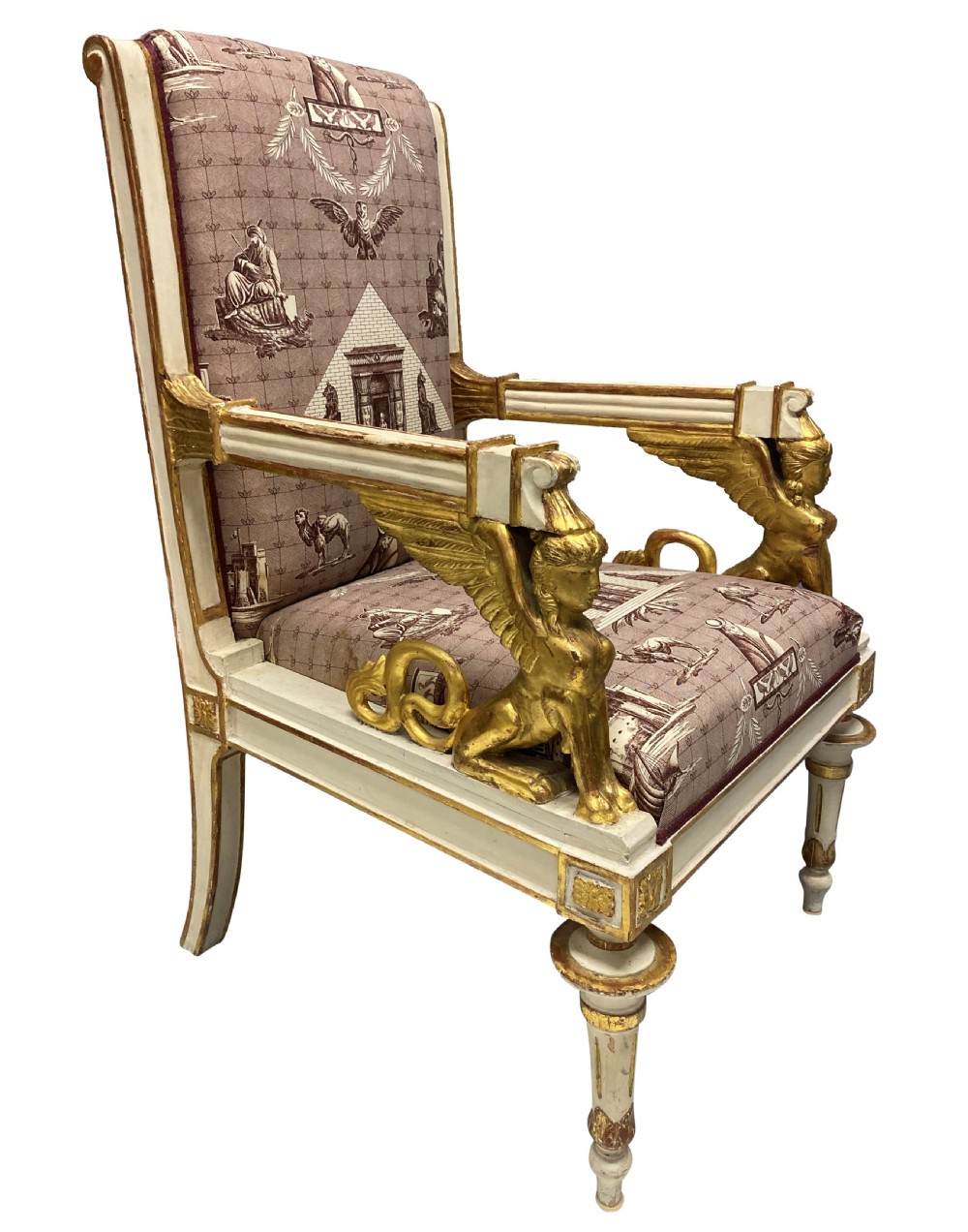 A French Empire armchair featuring a white painted frame with gilt sphinx arm supports and Egyptian revival fabric upholstery. View III