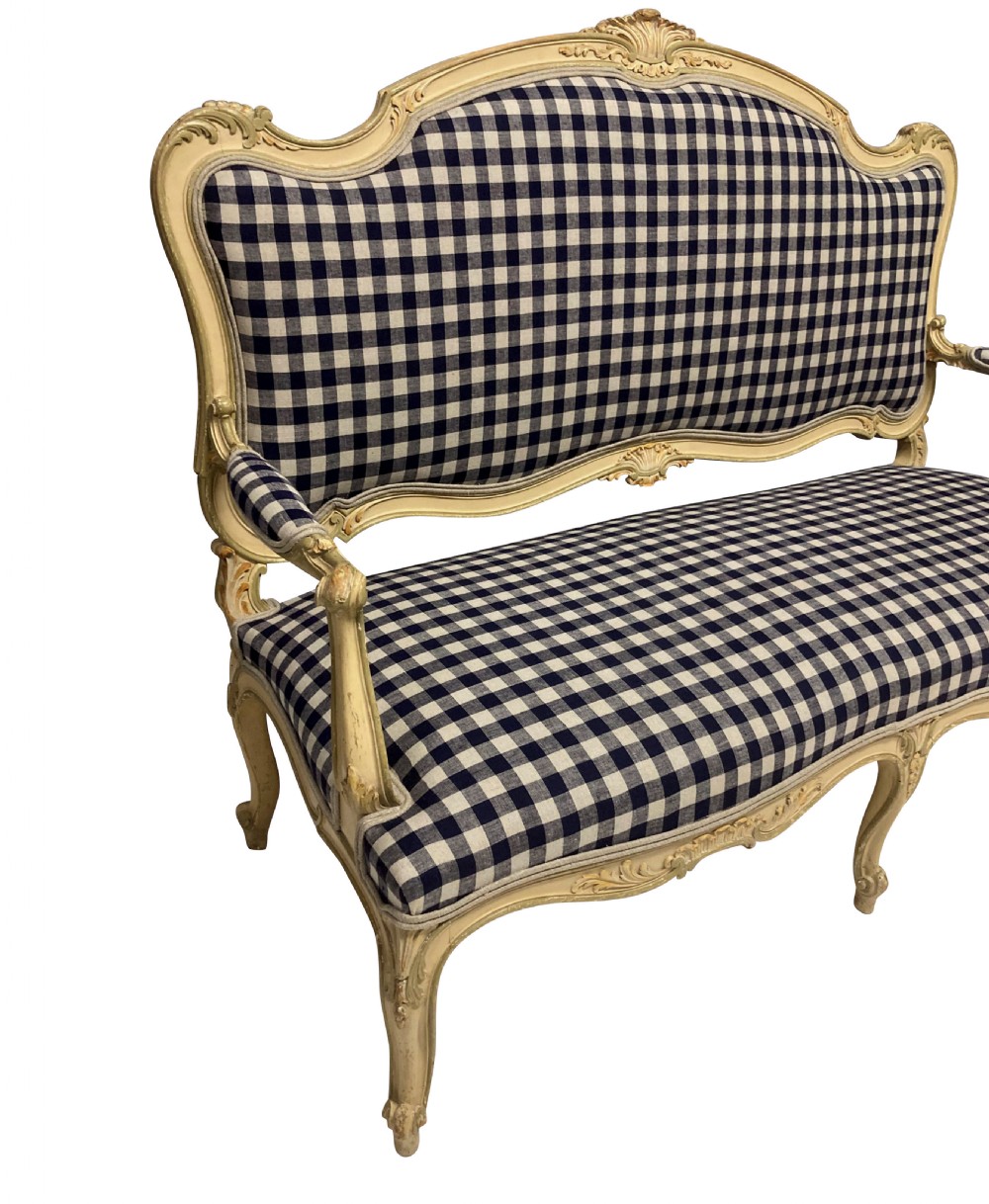 A painted Louis XV style upholstered canape with curved cabriole legs and a navy and cream gingham patterned fabric. View III