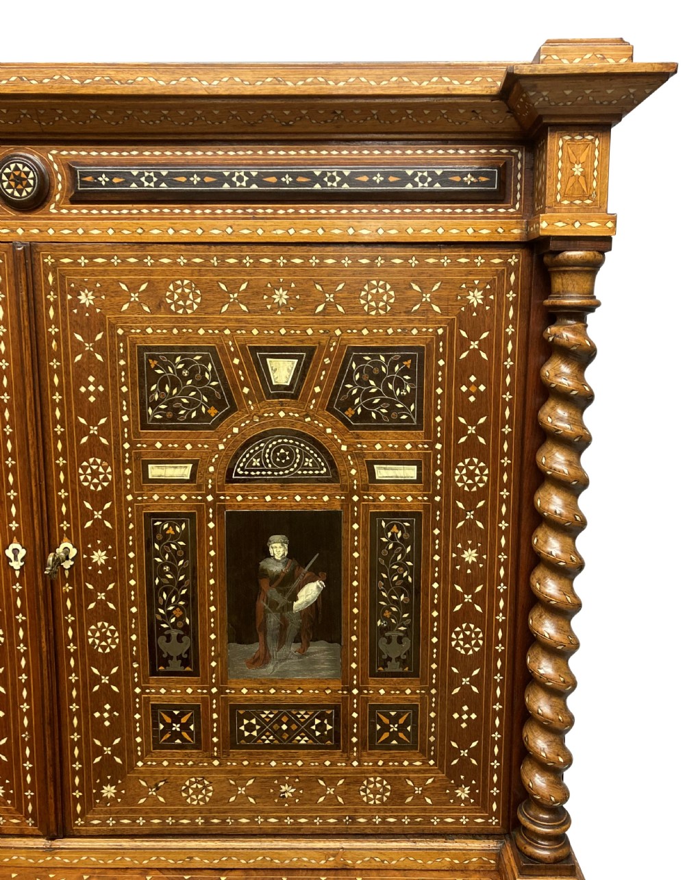 An ornate 19th-century Moorish Revival walnut cabinet secretaire on stand featuring intricate bone inlay and barley-twist legs. View V