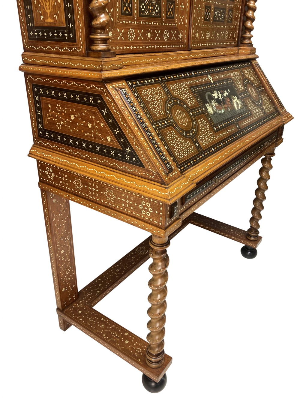 An ornate 19th-century Moorish Revival walnut cabinet secretaire on stand featuring intricate bone inlay and barley-twist legs. View XI
