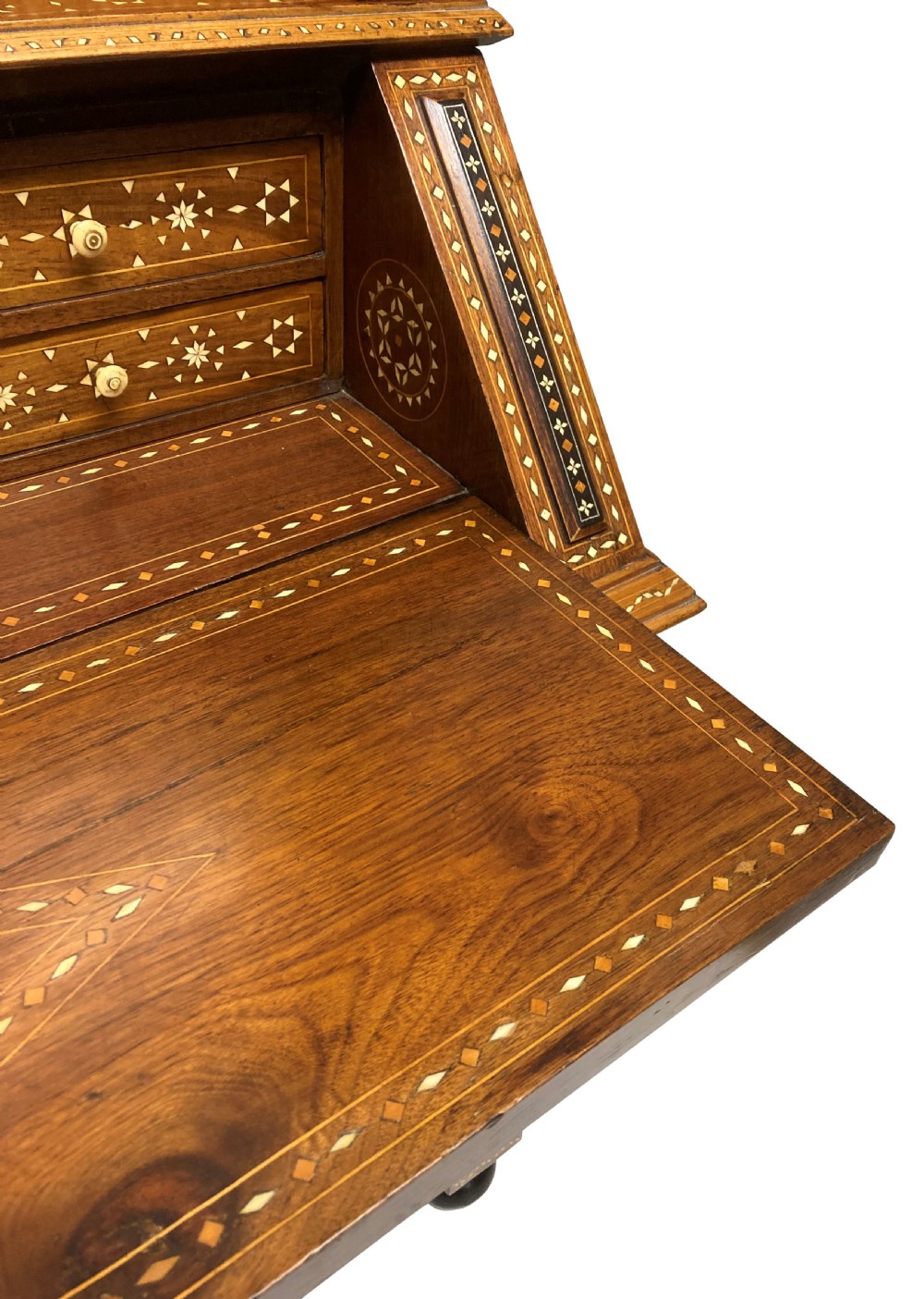 An ornate 19th-century Moorish Revival walnut cabinet secretaire on stand featuring intricate bone inlay and barley-twist legs. View XV