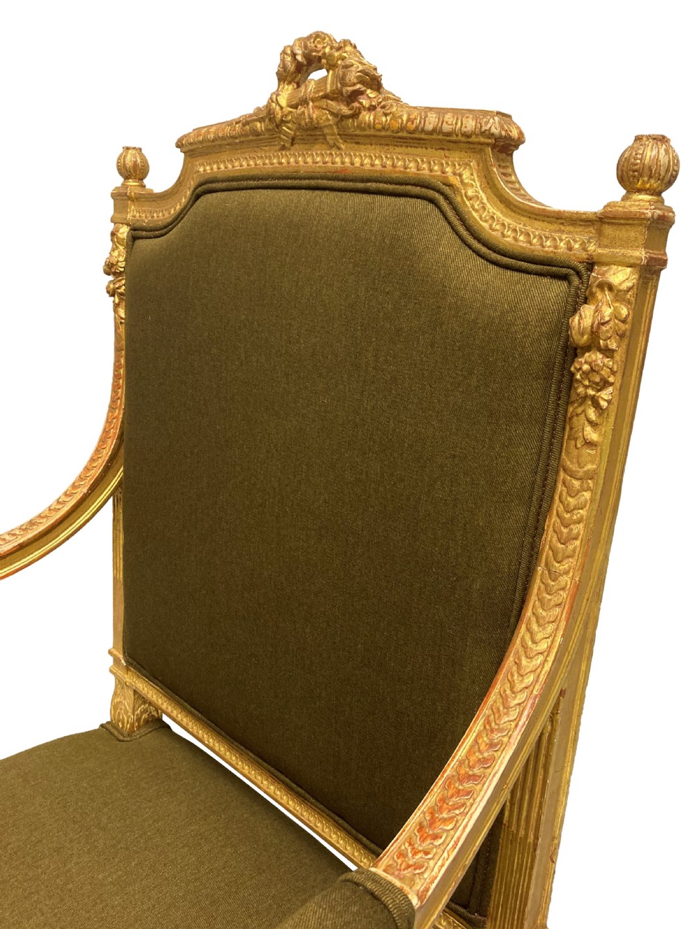 A Louis XIV style giltwood armchair featuring a gold leaf carved frame, turned arm supports, and dark olive green fabric upholstery. View VI