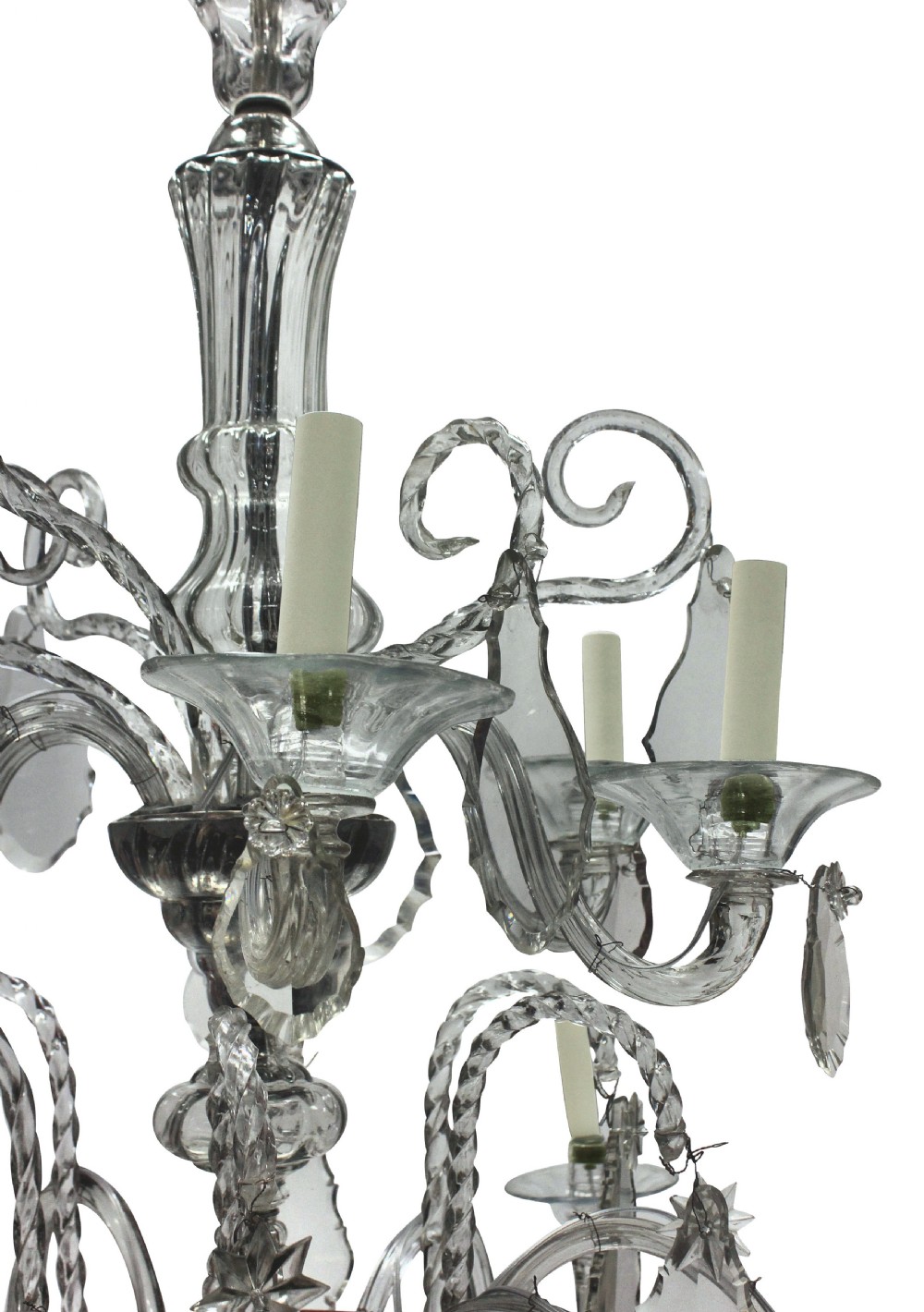 A Venetian blown clear glass twelve-branch chandelier featuring scrolled glass arms, candle sleeves, decorative glass drip pans, and crystal drops. View III
