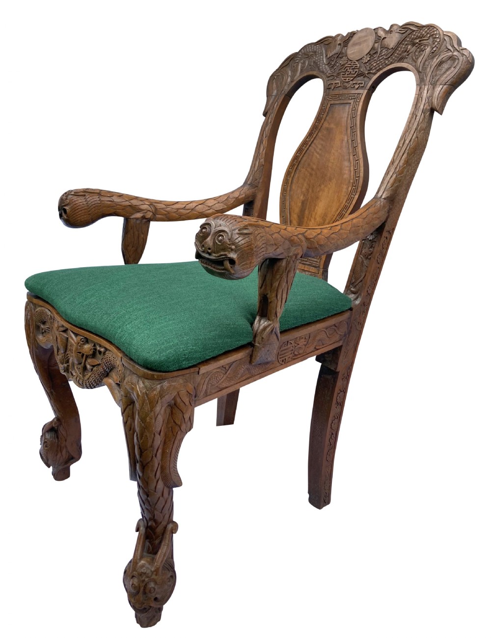 A pair of 19th-century carved teak Chinese armchairs featuring dragon motif armrests, detailed back splats, cabriole legs, and green upholstered seat cushions. View VI