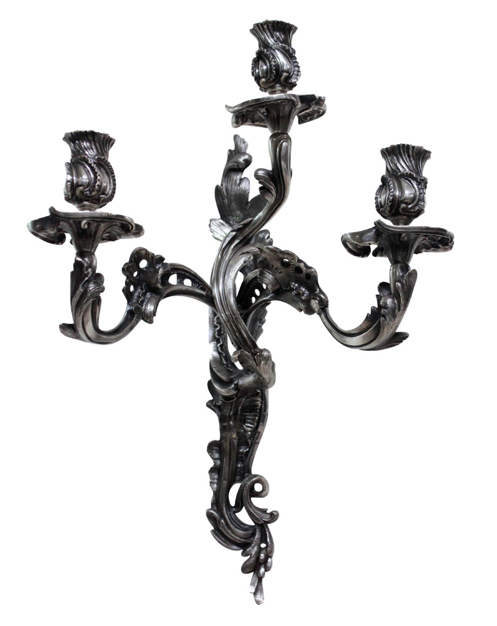 A pair of three-light silver-plated wall sconces with ornate Rococo scrolling branches and leaf ornamentation. View II