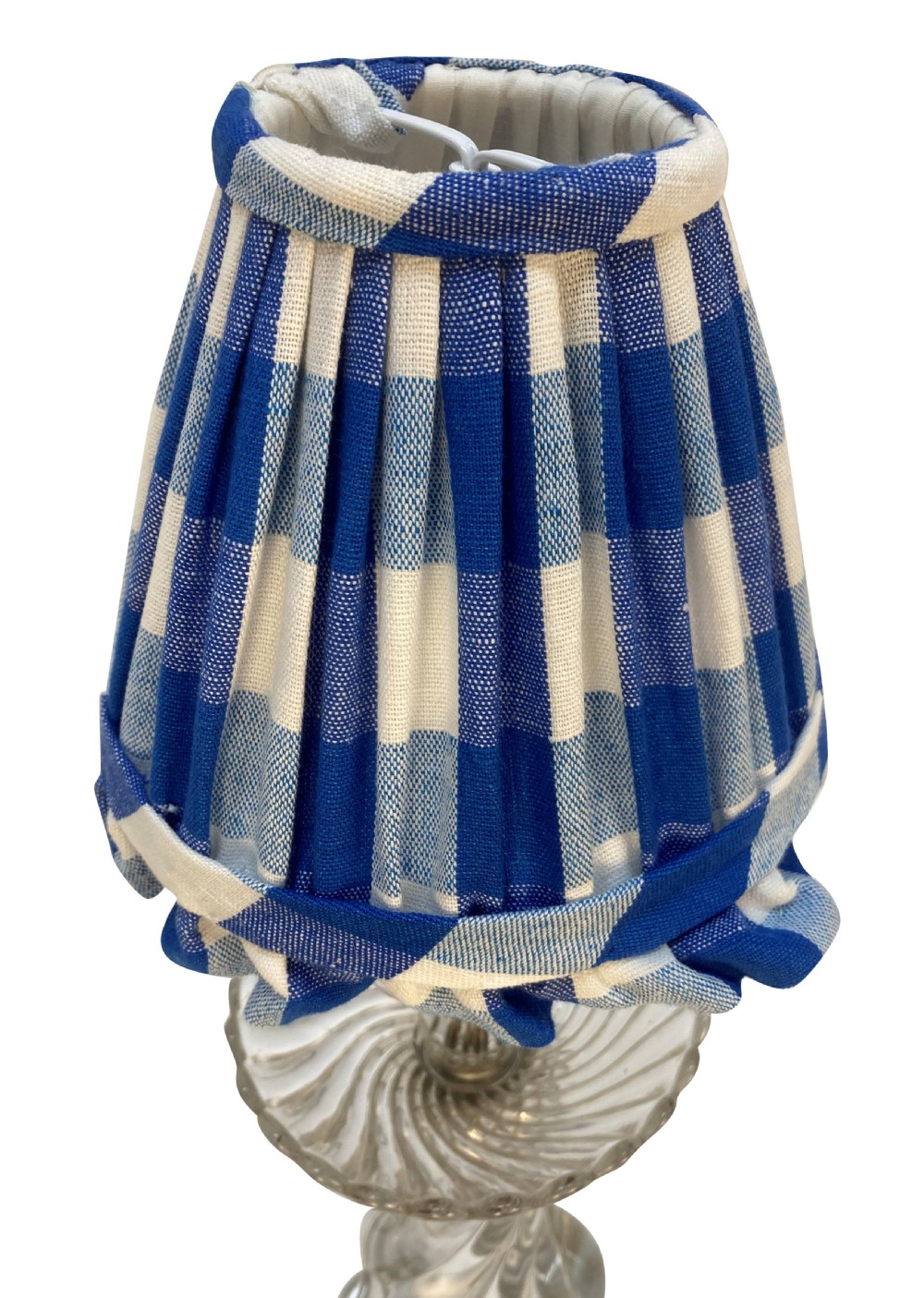A 1930s French table lamp featuring a twisted moulded clear glass stem with a scalloped dish detail, topped with a blue and white gingham pleated lampshade. View IV