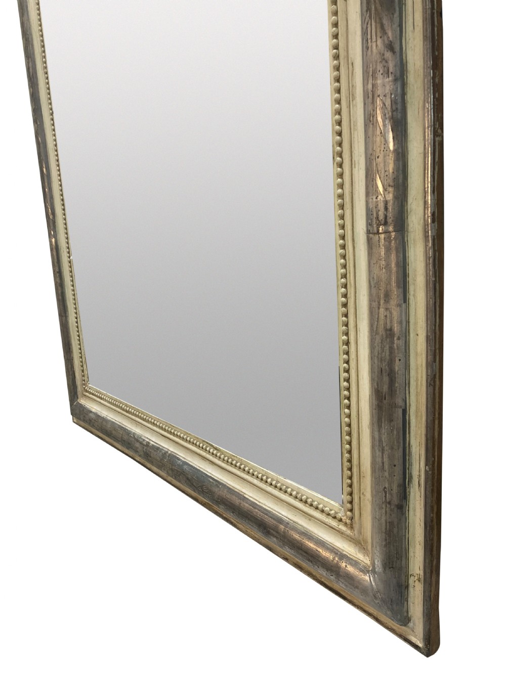 An antique French silver leaf overmantel mirror featuring rounded top corners, a beaded inner rim, and subtle etched leaf motifs on the frame. View IV