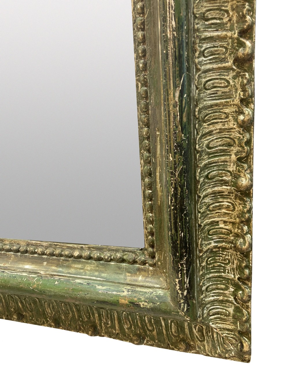 An arched Louis XV style rectangular overmantel mirror featuring a carved ornate scroll crest and a weathered green and gilded frame. View III