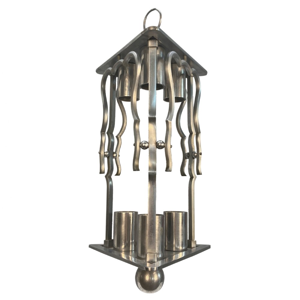 An Art Deco steel hanging lantern fixture featuring geometric metalwork, cylindrical socket covers, a top loop for suspension, and a spherical bottom finial. View II