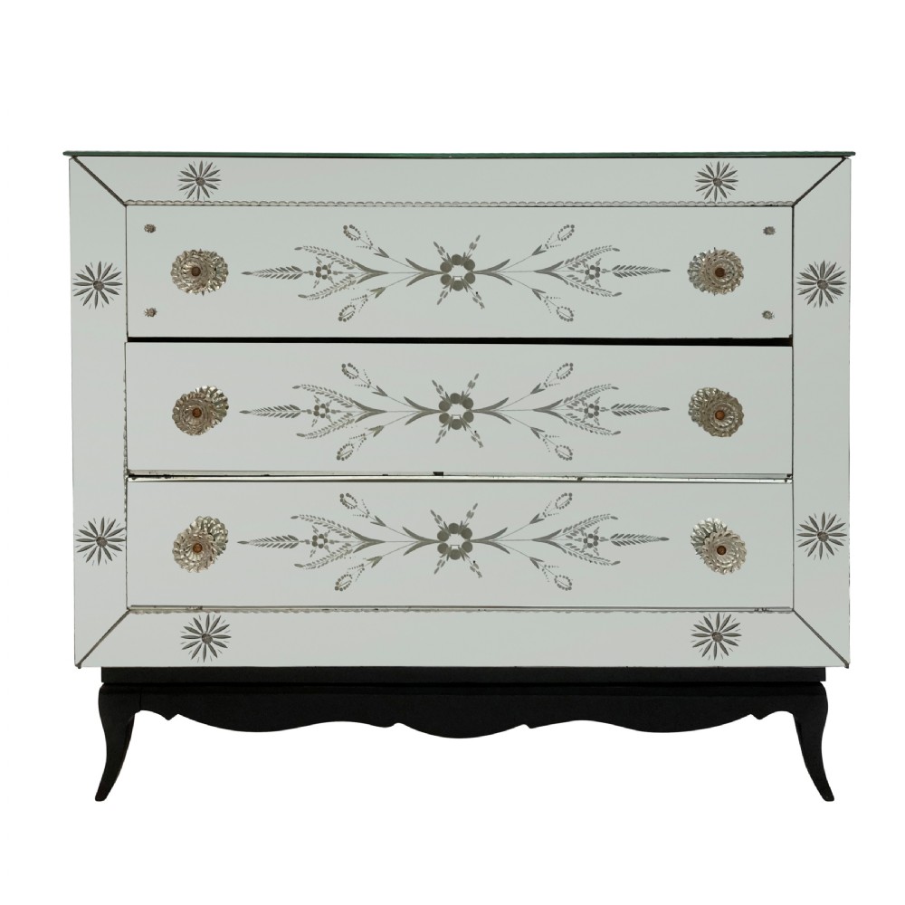 A French 1930s Art Deco chest of drawers featuring three etched mirrored glass drawers and a dark painted base with cabriole legs.